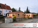 Gelegenheit! 2 Häuser zum Preis von einem! Sanierungsbedürftige DHH + renov. Bungalow in Neunkirchen - Außenansicht Bild 1